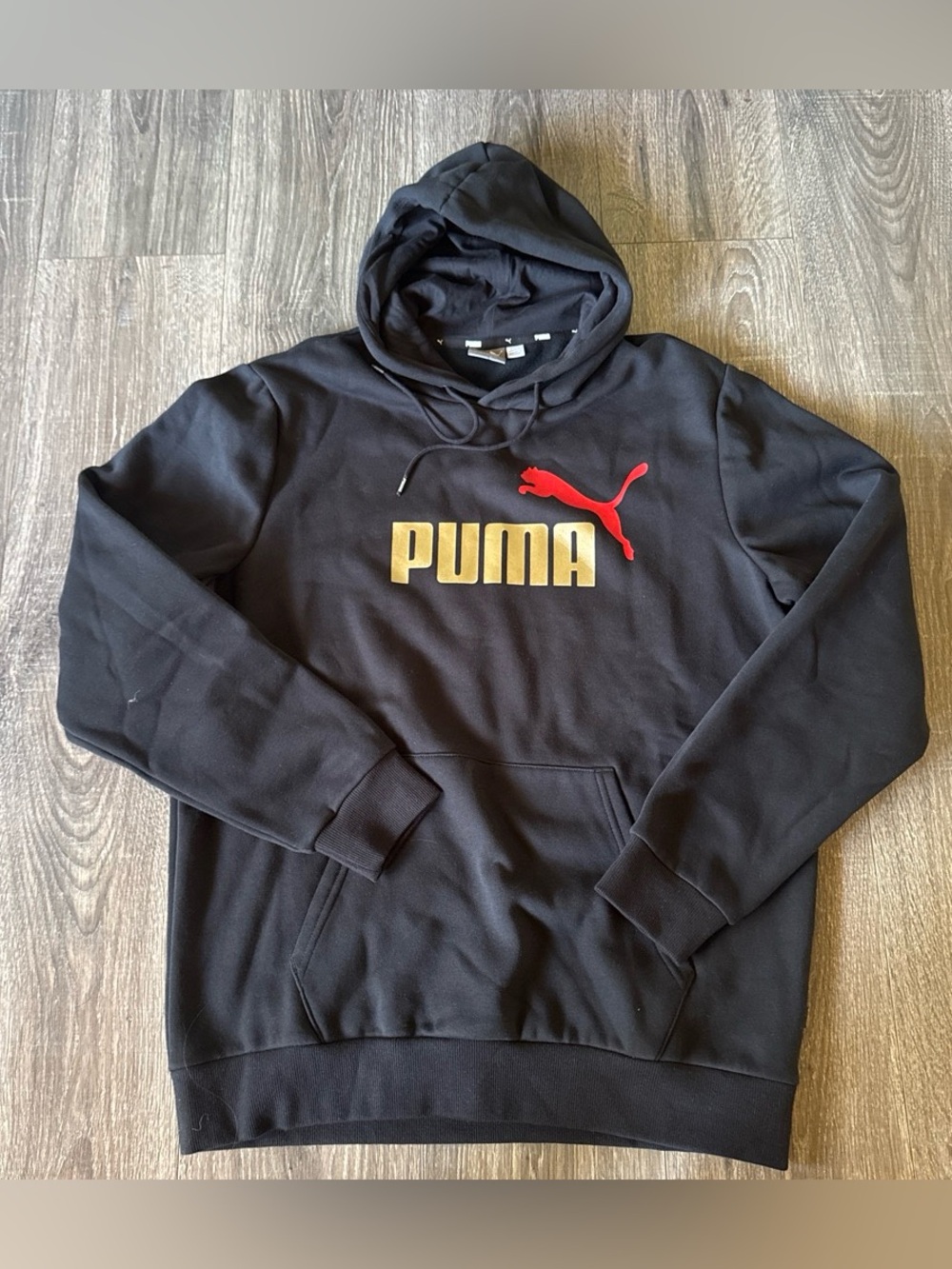 Puma Black Hoodie with Gold Logo and Red Puma